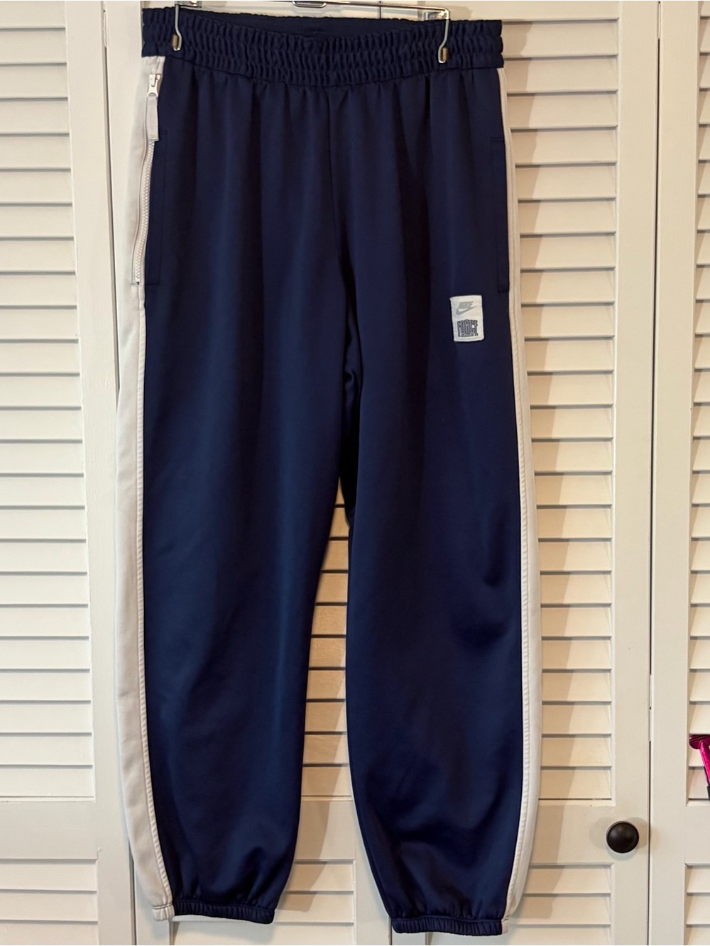 Nike Men’s Navy Track Pants with White Side Stripes